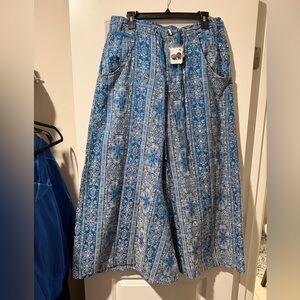Free People Teal and White Patterned Flare pants 🔥 Size 12